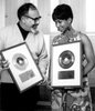Thumbnail image for Aretha Franklin & Jerry Wexler RIAA Gold 45 White Matte Presentation